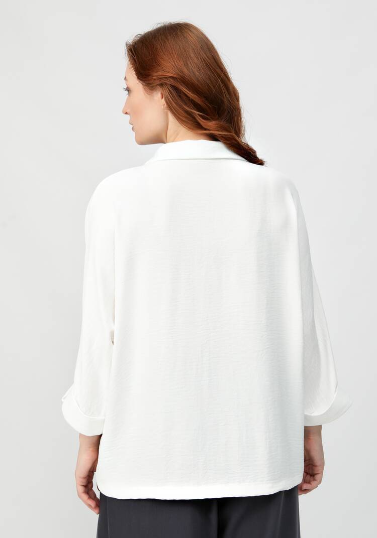 Блуза с патой на рукавах шир.  750, рис. 18