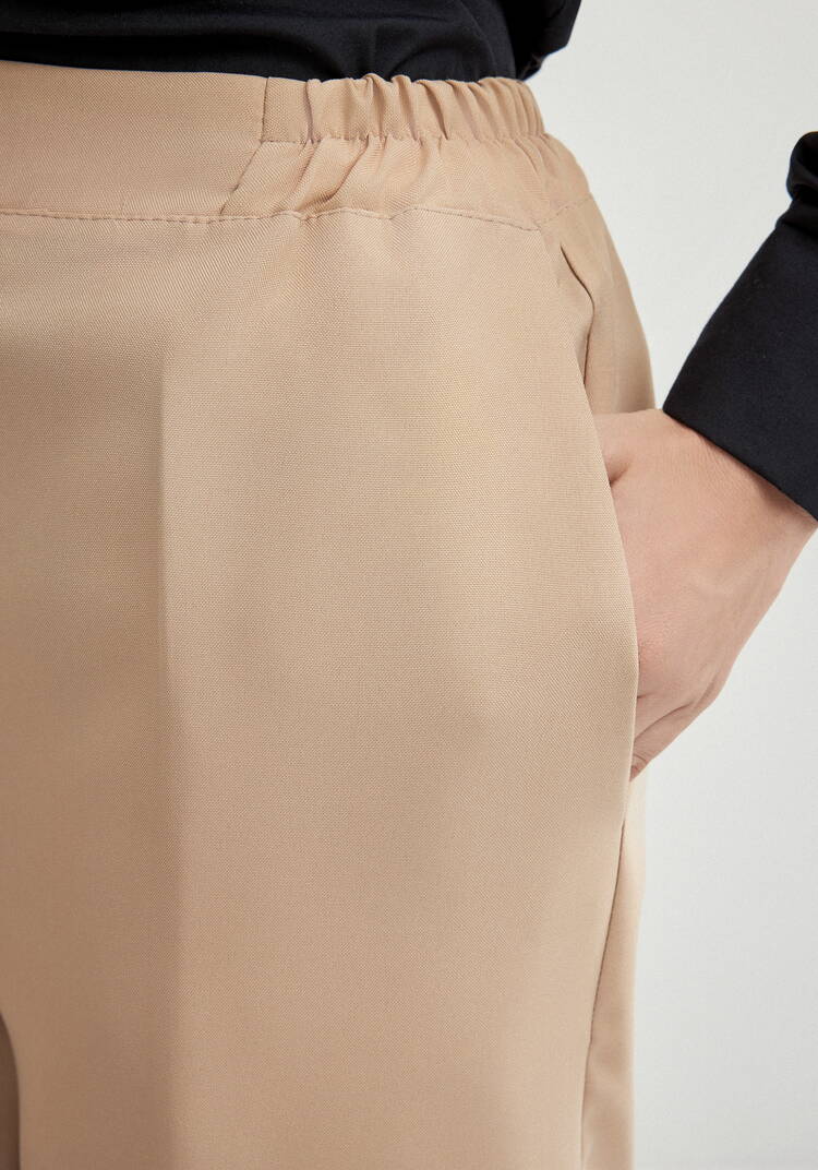 Брюки на эластичной ленте свободного кроя шир.  750, рис. 22