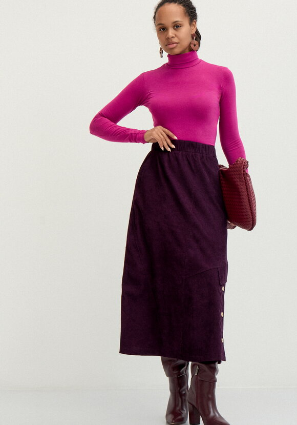 Юбка с декоративными пуговицами и клапаном шир.  580, рис. 9