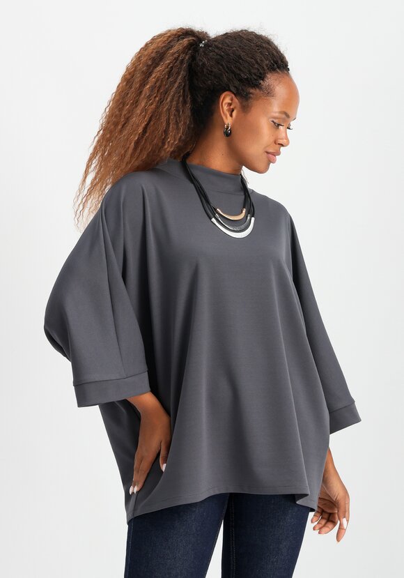 Блуза из плотного трикотажа шир.  580, рис. 17