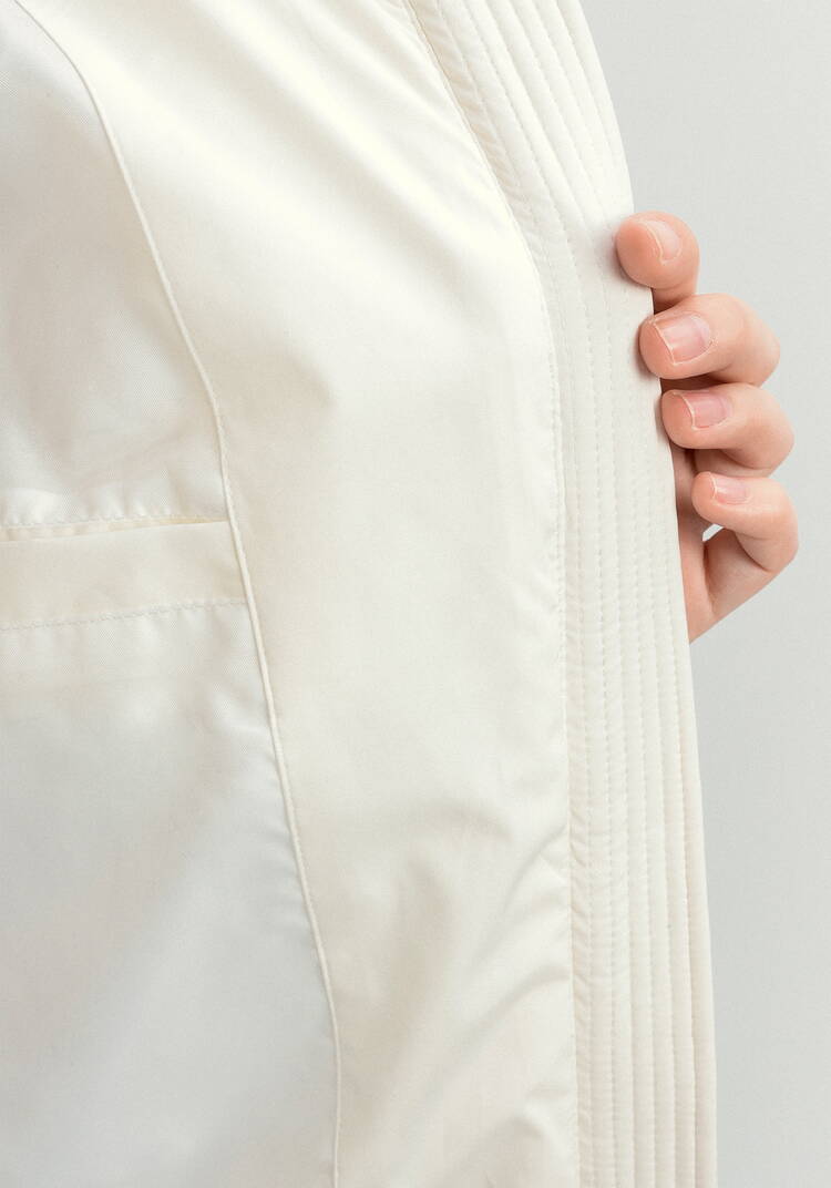 Пуховик стеганый с накладными карманами шир.  750, рис. 21