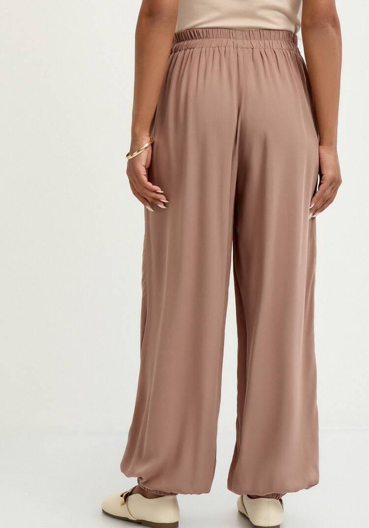 Брюки широкие с карманами на резинке по низу шир.  750, рис. 35