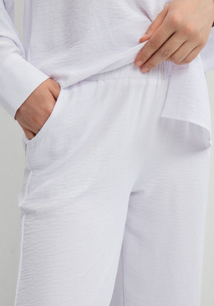 Брюки свободного кроя с боковыми карманами шир.  750, рис. 4