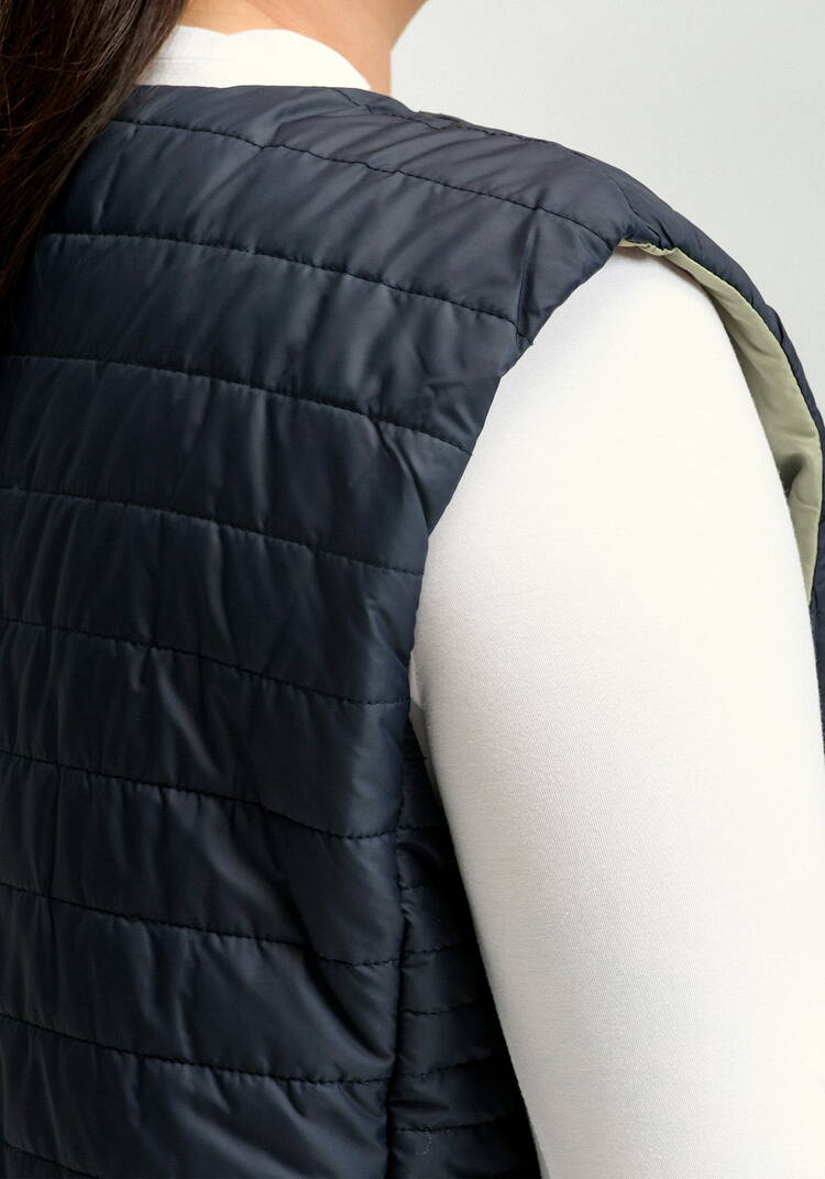 Жилет двухсторонний на молнии шир.  750, рис. 23