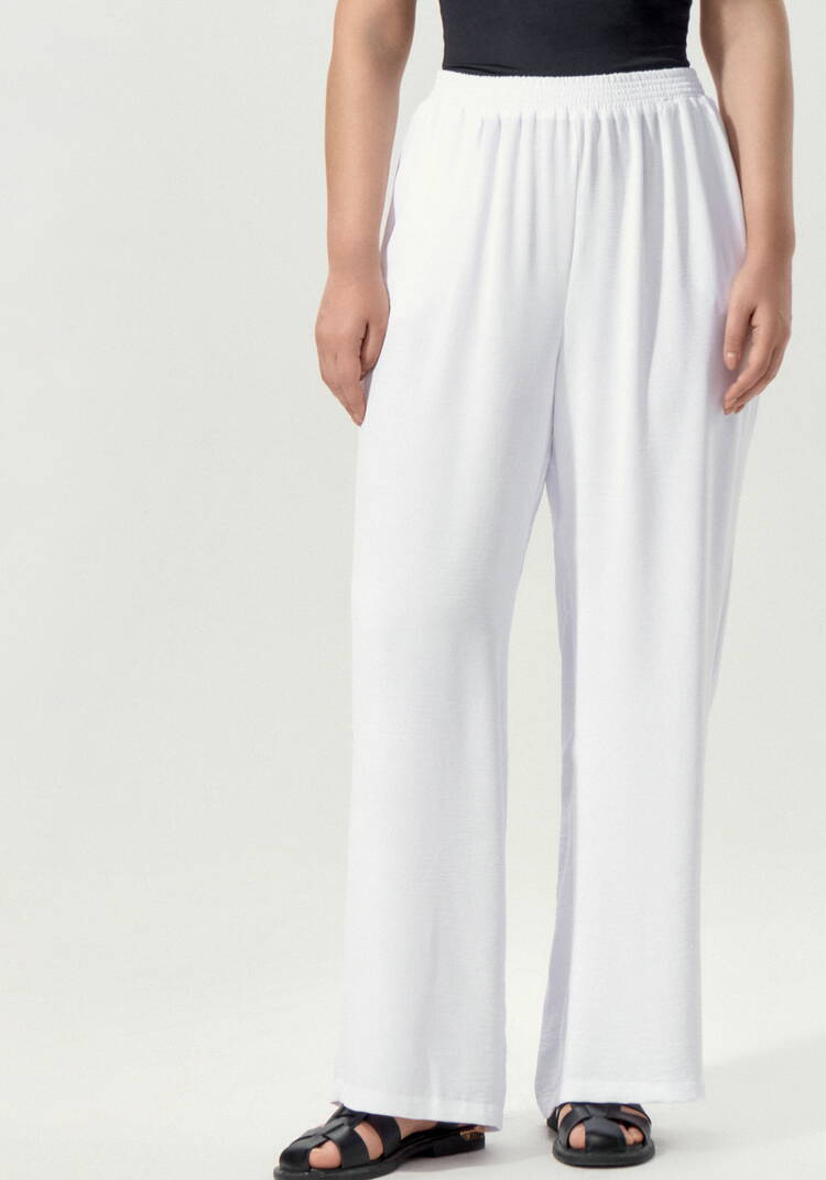 Брюки свободные на резинке по поясу шир.  750, рис. 11