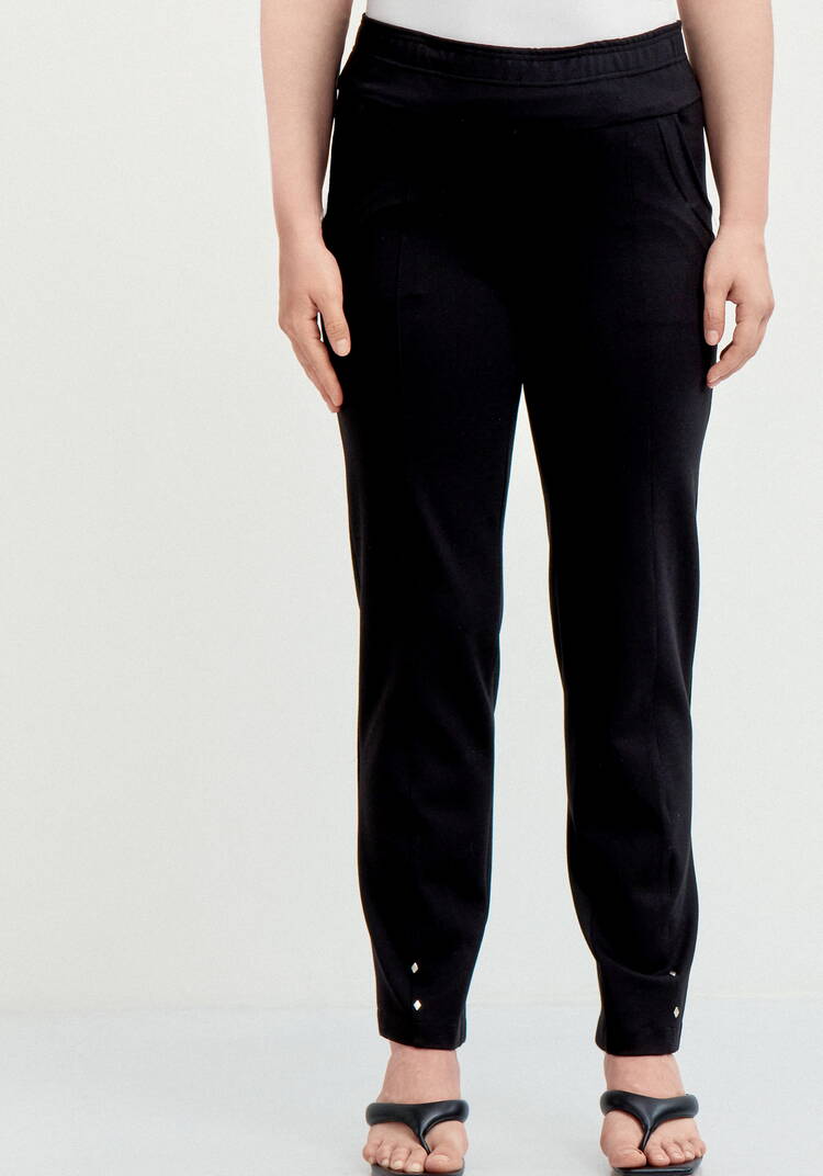 Брюки с эффектом утяжки и декором по низу шир.  750, рис. 4