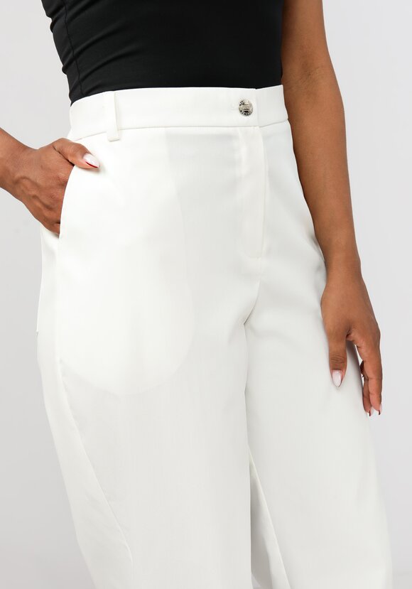 Брюки с вышивкой на кармане шир.  580, рис. 10