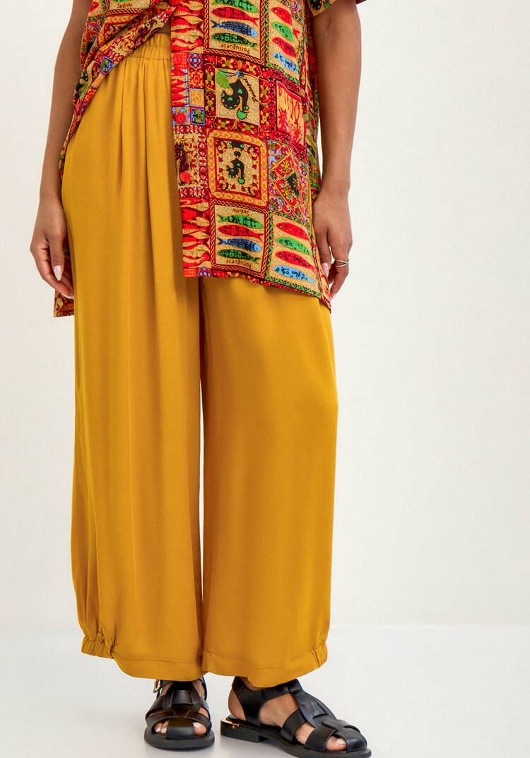 Брюки свободного кроя на резинке по низу шир.  750, рис. 16