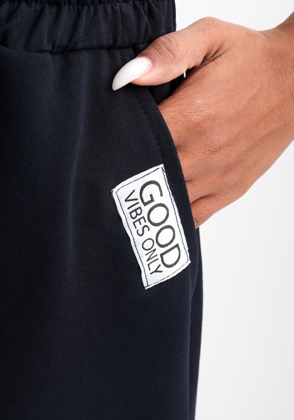 Брюки трикотажные с защипами по низу шир.  580, рис. 13