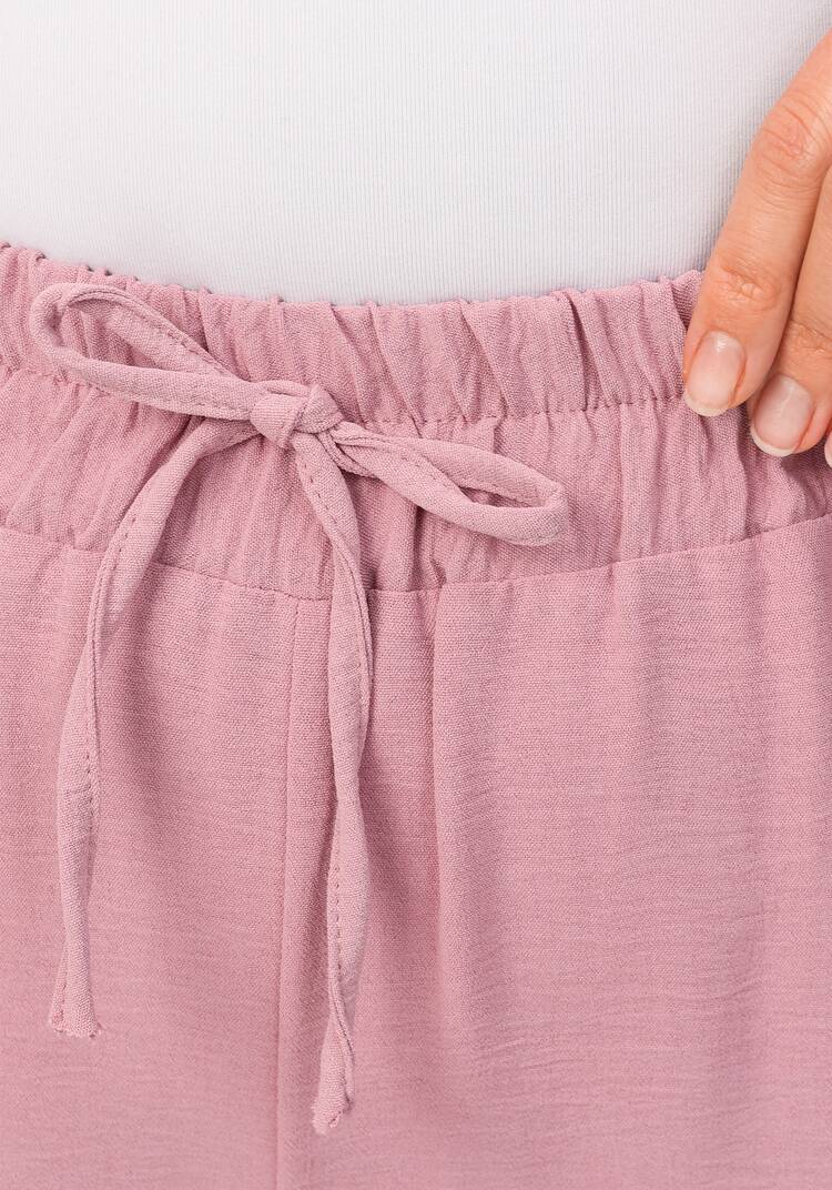 Костюм: брюки и блуза с лаконичным принтом шир.  750, рис. 47