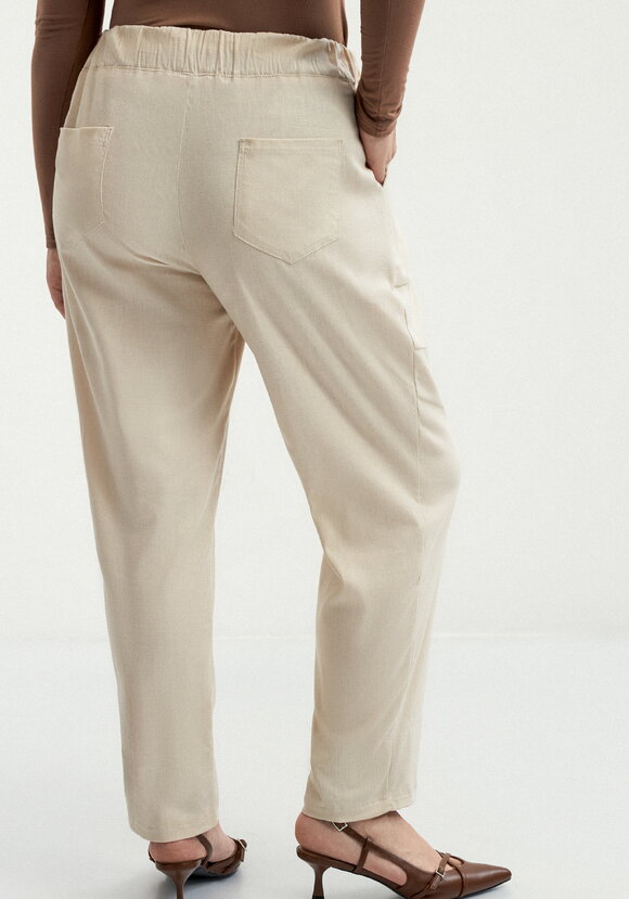 Брюки зауженные с контрастной отделкой шир.  580, рис. 21