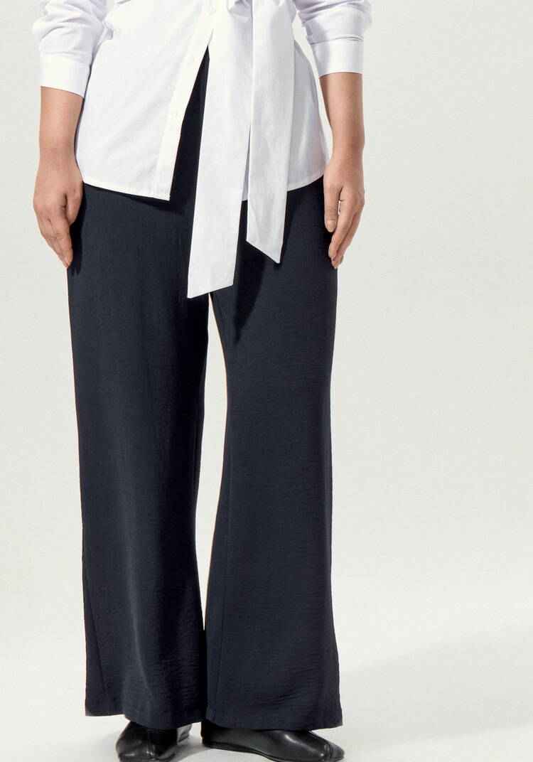 Брюки свободные на резинке по поясу шир.  750, рис. 23