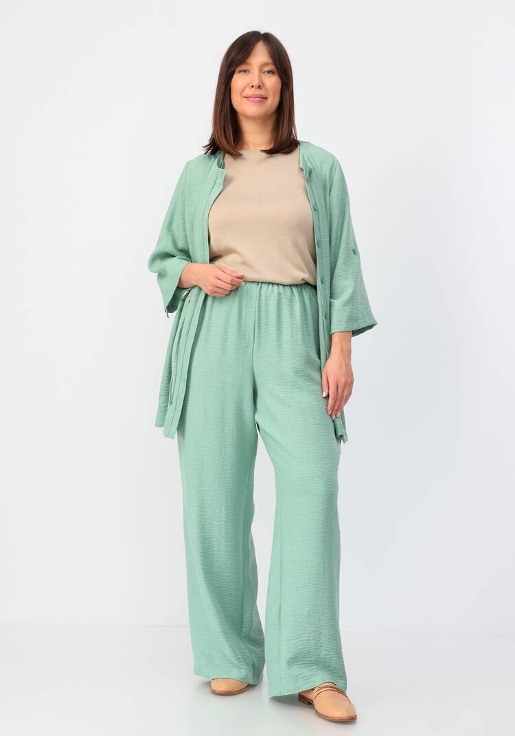 Брюки свободного кроя на резинке по поясу шир.  750, рис. 15