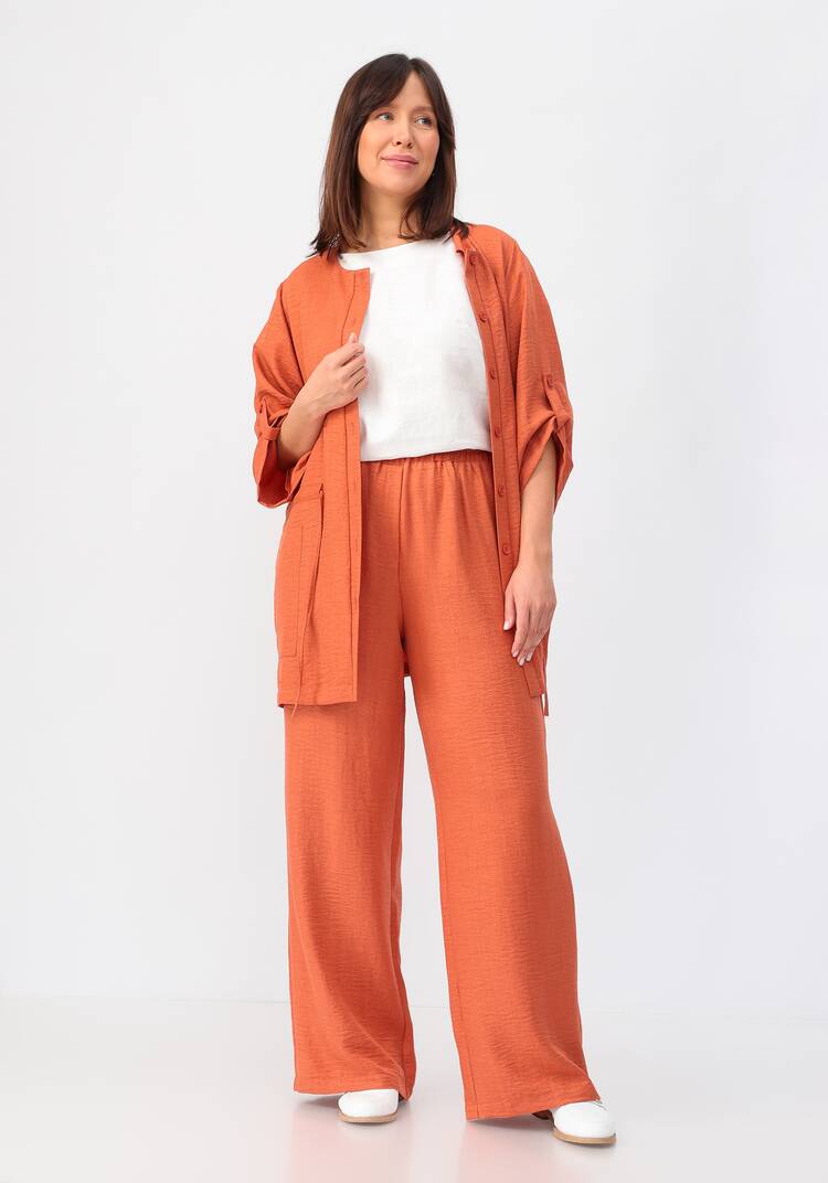 Брюки свободного кроя на резинке по поясу шир.  750, рис. 25