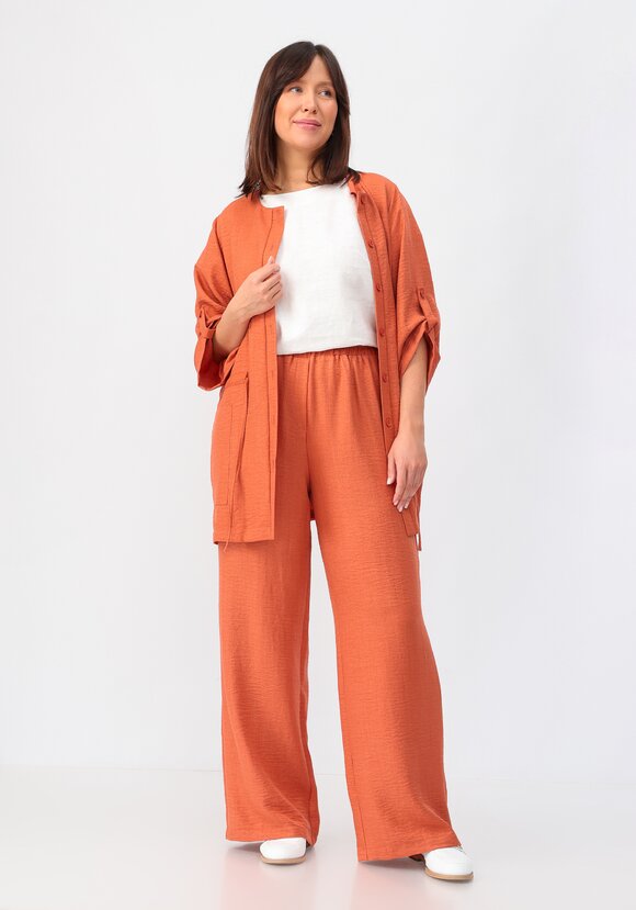 Брюки свободного кроя на резинке по поясу шир.  580, рис. 25