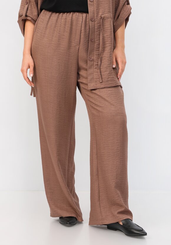 Брюки свободного кроя на резинке по поясу шир.  580, рис. 7