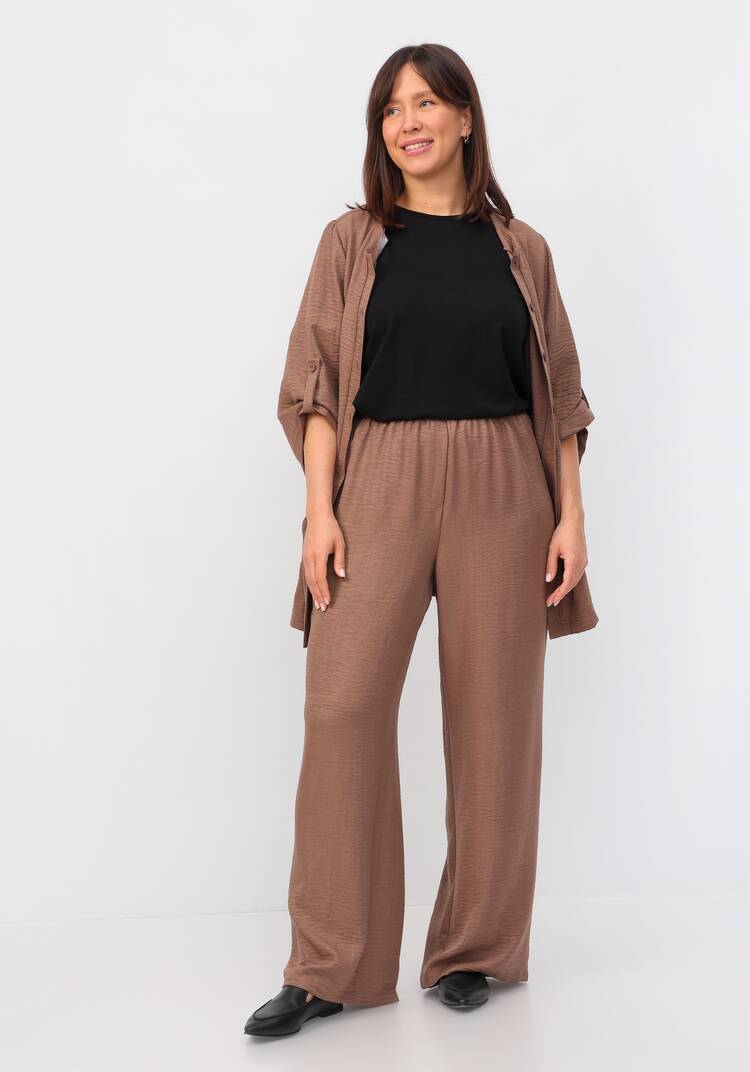 Брюки свободного кроя на резинке по поясу шир.  750, рис. 8