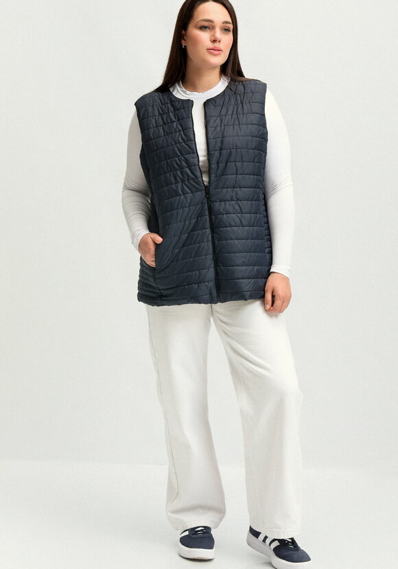 Жилет двухсторонний на молнии шир.  580, рис. 25