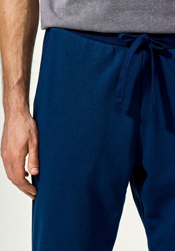 Брюки с карманами и манжетами по низу шир.  580, рис. 28