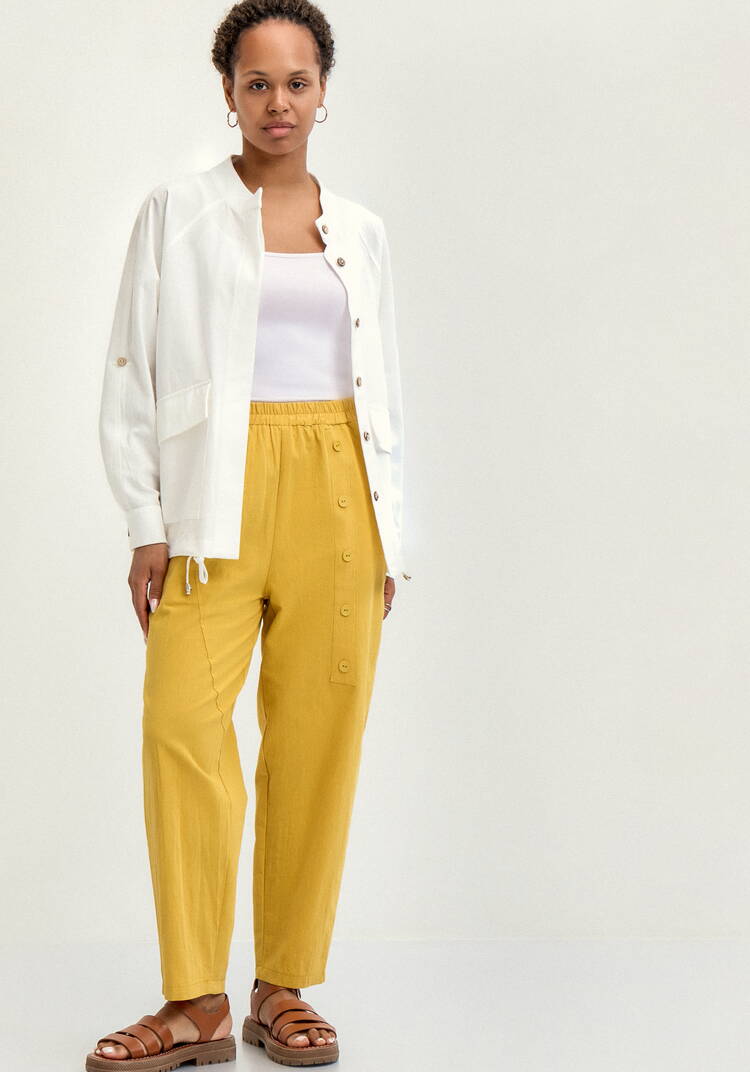 Брюки с декоративной планкой и карманами шир.  750, рис. 39