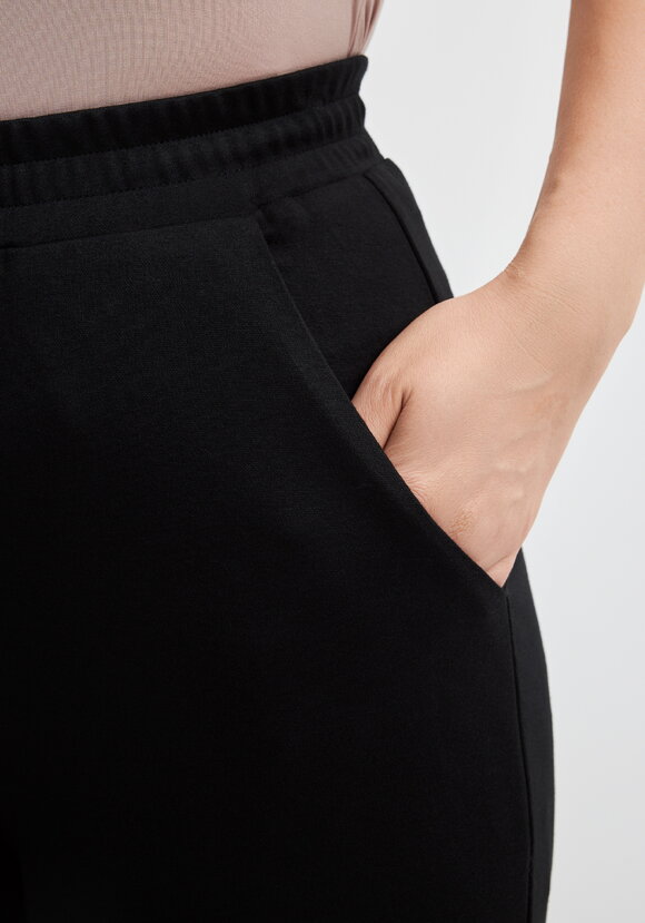 Брюки трикотажные свободного кроя шир.  580, рис. 5