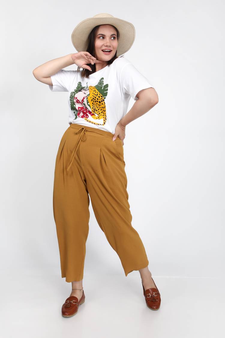 Брюки свободного кроя на эластичной ленте шир.  750, рис. 23