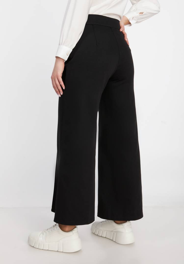 Брюки на пуговицах шир.  750, рис. 7