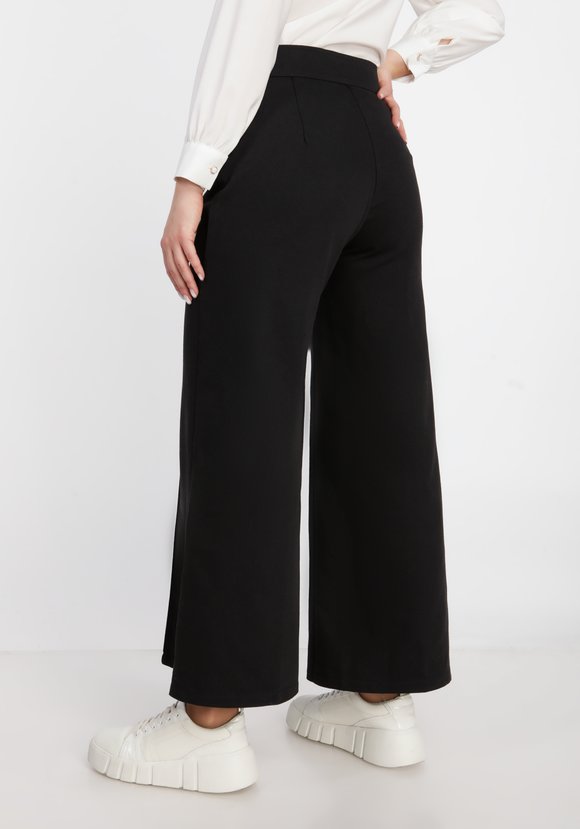 Брюки на пуговицах шир.  580, рис. 7