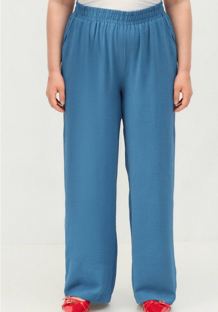 Брюки с карманами, свободного кроя шир.  750, рис. 32