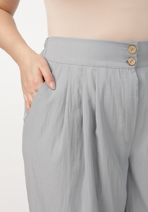 Брюки с защипами на поясе шир.  580, рис. 8