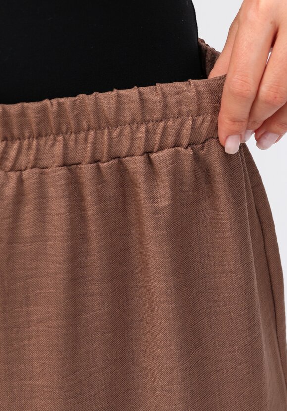 Брюки свободного кроя на резинке по поясу шир.  580, рис. 5