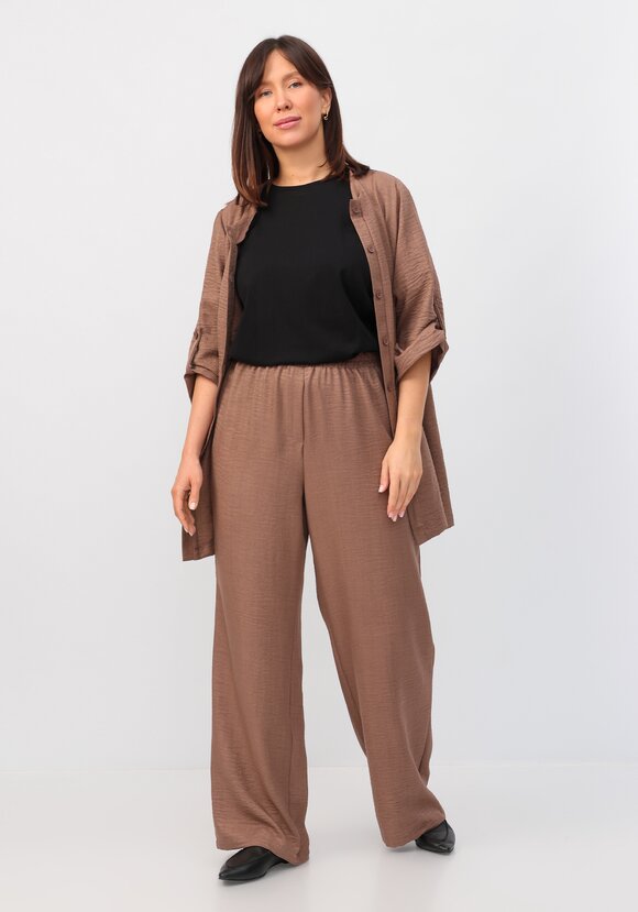 Брюки свободного кроя на резинке по поясу шир.  580, рис. 9