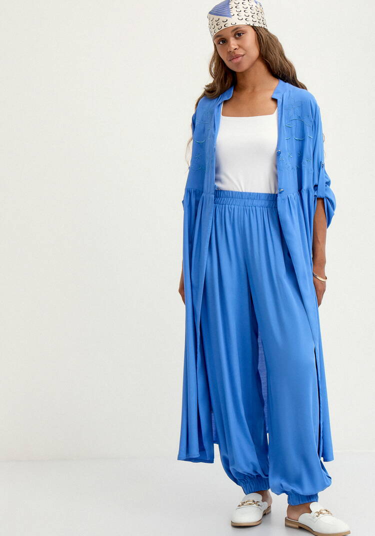 Брюки широкие с карманами на резинке по низу шир.  750, рис. 24