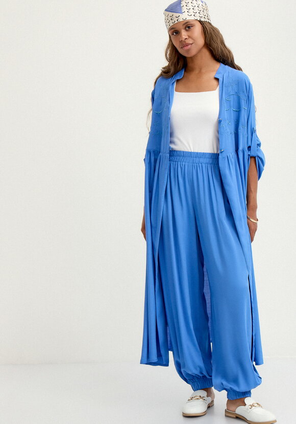 Брюки широкие с карманами на резинке по низу шир.  580, рис. 24