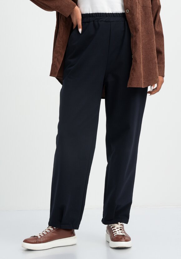 Брюки трикотажные с защипами по низу шир.  580, рис. 9