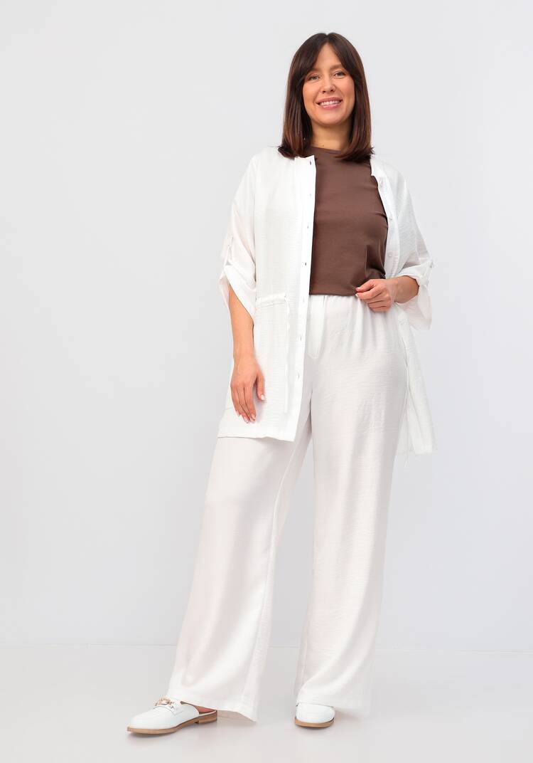 Брюки свободного кроя на резинке по поясу шир.  750, рис. 38