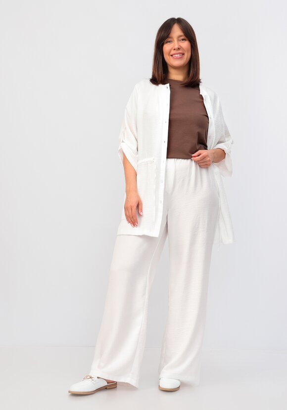 Брюки свободного кроя на резинке по поясу шир.  580, рис. 38