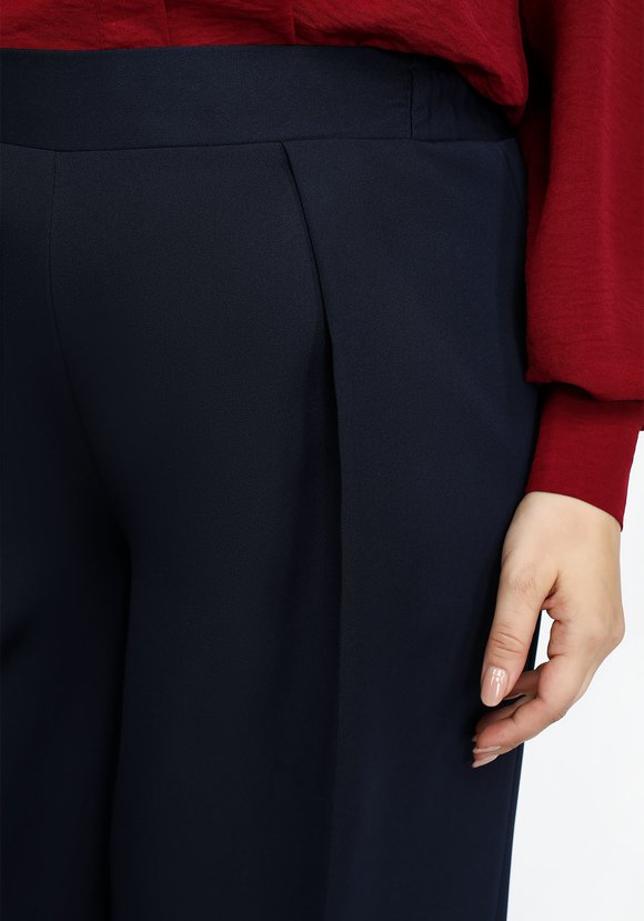 Брюки с защипами однотонные шир.  580, рис. 4