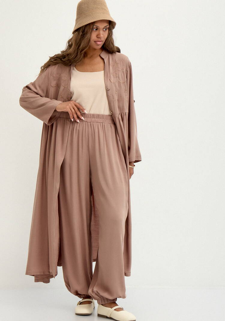 Брюки широкие с карманами на резинке по низу шир.  750, рис. 38