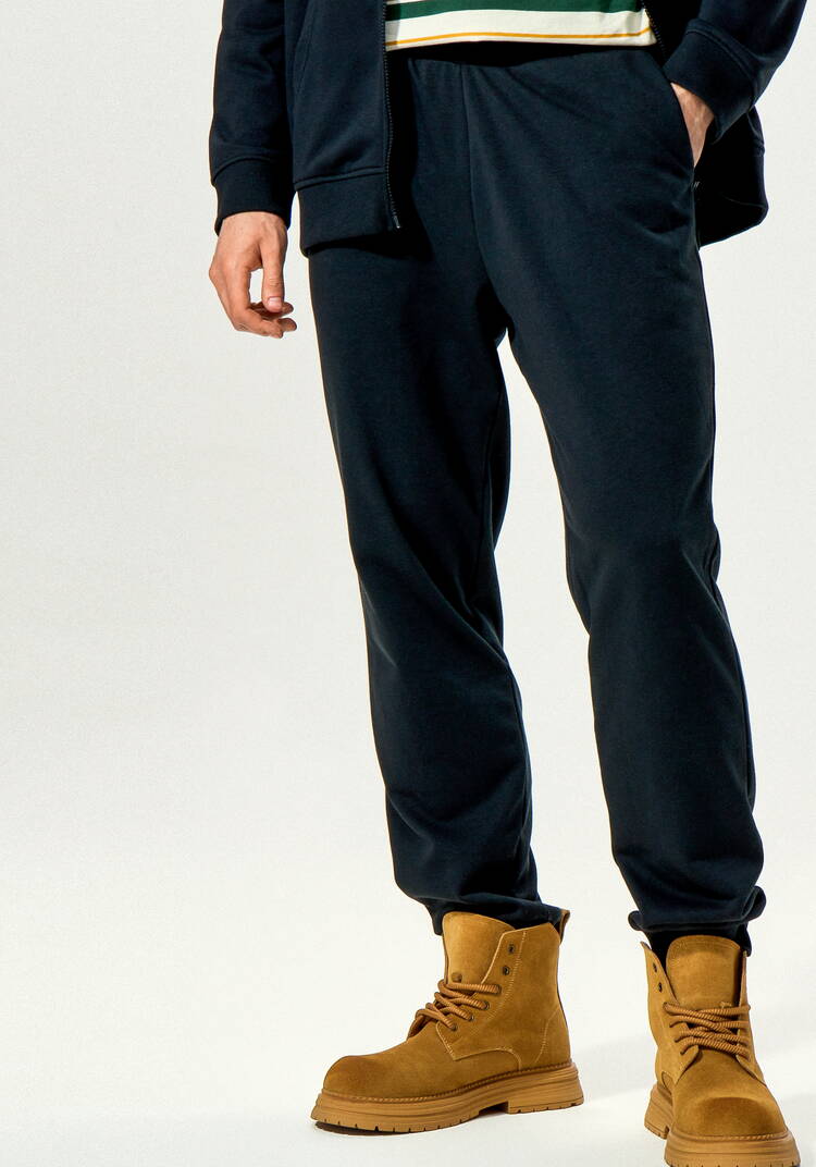 Брюки с карманами и манжетами по низу шир.  750, рис. 10