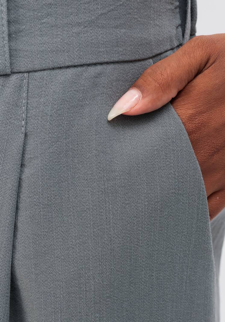 Брюки свободного кроя с защипами на поясе шир.  750, рис. 5