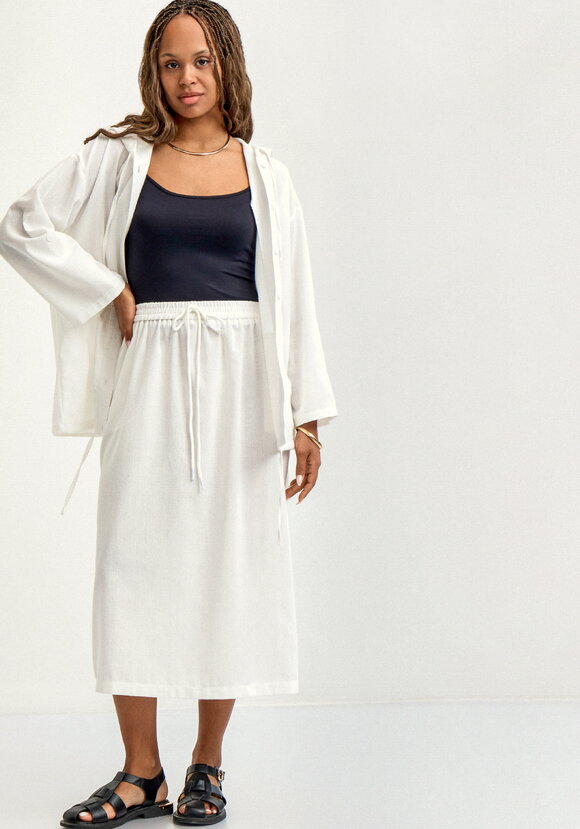 Юбка изо льна свободного кроя шир.  580, рис. 7