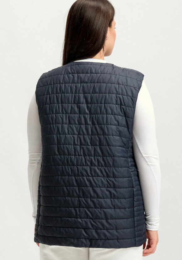 Жилет двухсторонний на молнии шир.  580, рис. 20