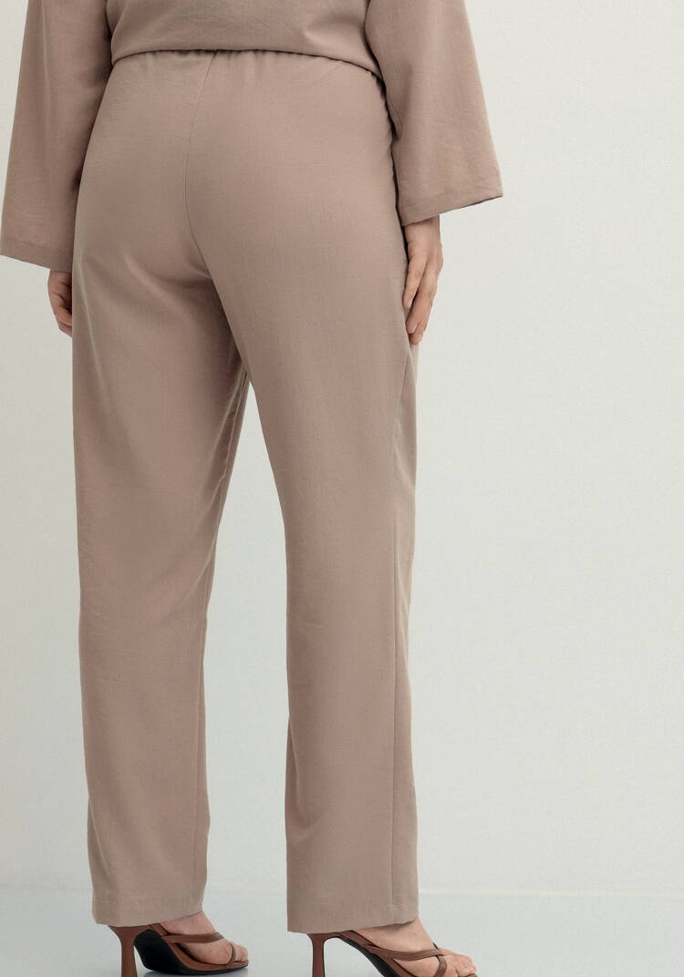 Брюки прямого кроя на резинке по поясу шир.  750, рис. 17