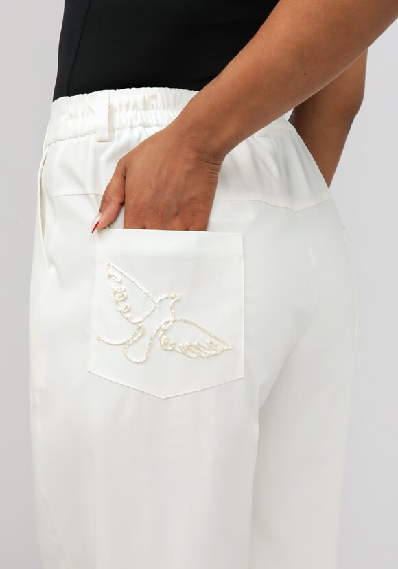 Брюки с вышивкой на кармане шир.  580, рис. 11