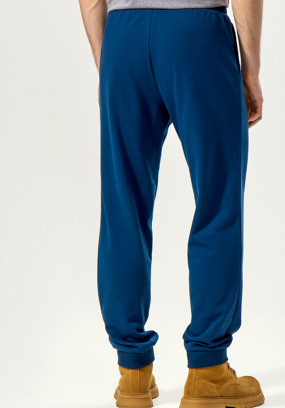 Брюки с карманами и манжетами по низу шир.  580, рис. 26