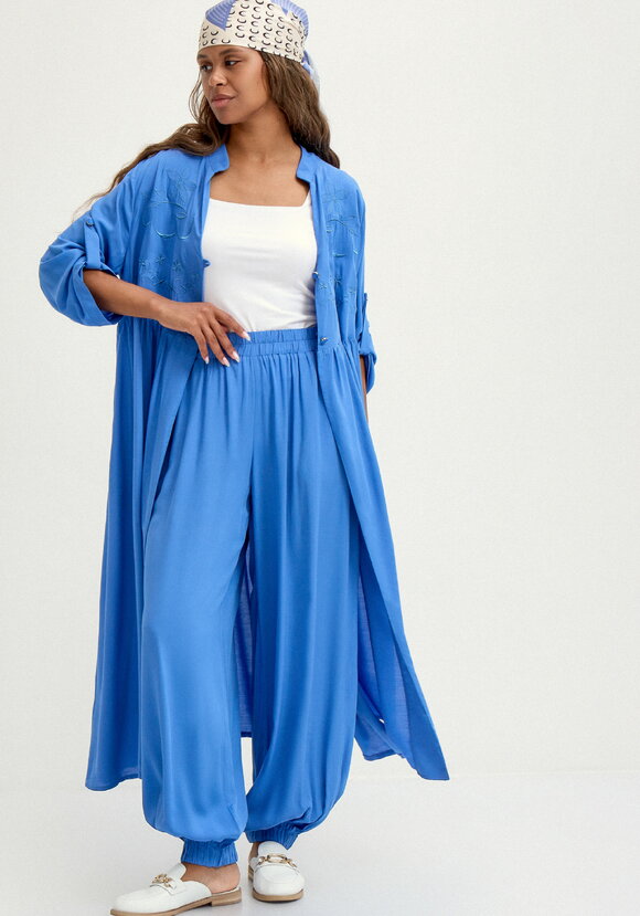 Брюки широкие с карманами на резинке по низу шир.  580, рис. 23