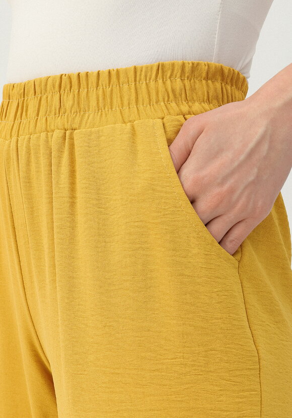 Брюки свободного кроя с боковыми карманами шир.  580, рис. 34