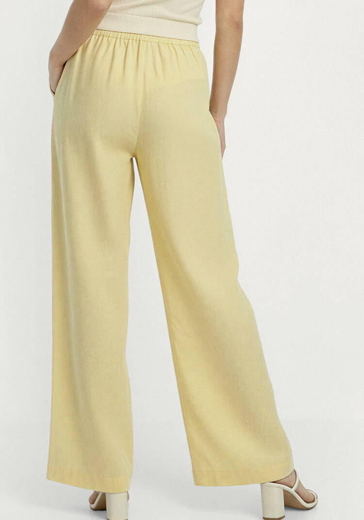 Брюки от бедра прямые изо льна шир.  750, рис. 11