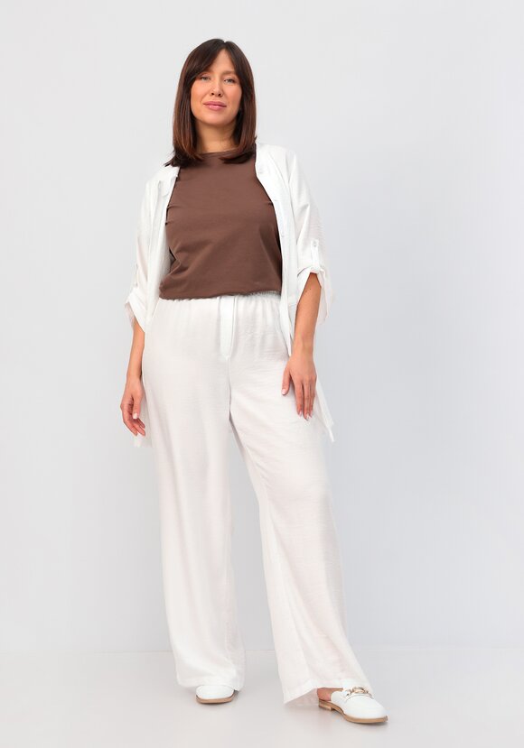 Брюки свободного кроя на резинке по поясу шир.  580, рис. 33